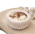 a white corduroy Bedsure ComfyFleece cat bed