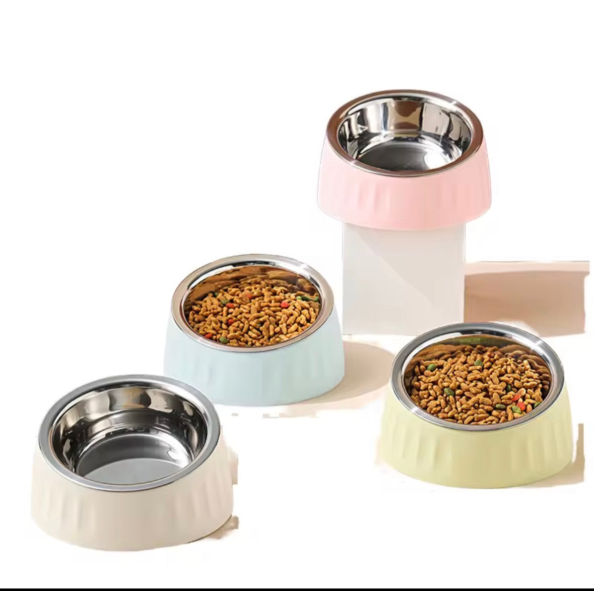 These are colorful stainless steel pet bowls with an elevated, tilted design.